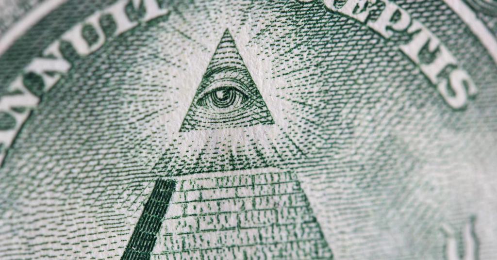 Знак пирамиды на банкноте американской валюты